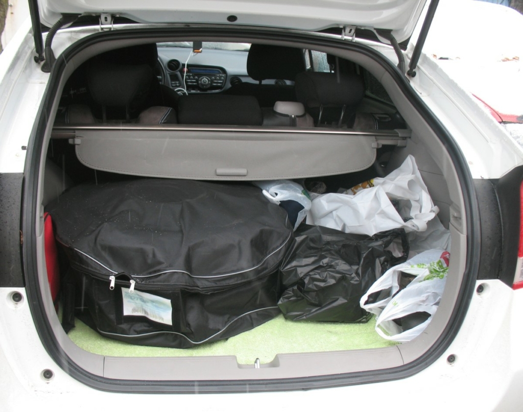 В багажнике наличие ГБО в машине выдает только "запаска", расположенная не в своей нише.